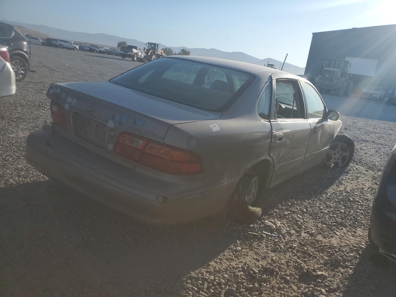1999 Toyota Avalon Xl Tan vin: 4T1BF18B5XU329343