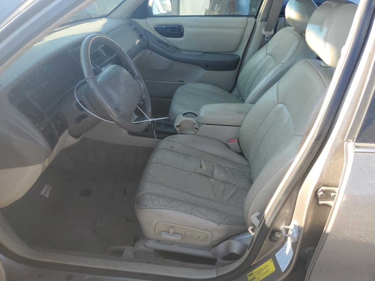 1999 Toyota Avalon Xl Tan vin: 4T1BF18B5XU329343