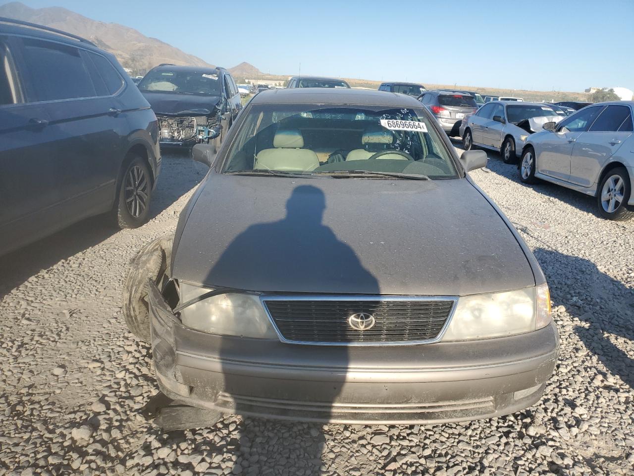 1999 Toyota Avalon Xl Tan vin: 4T1BF18B5XU329343