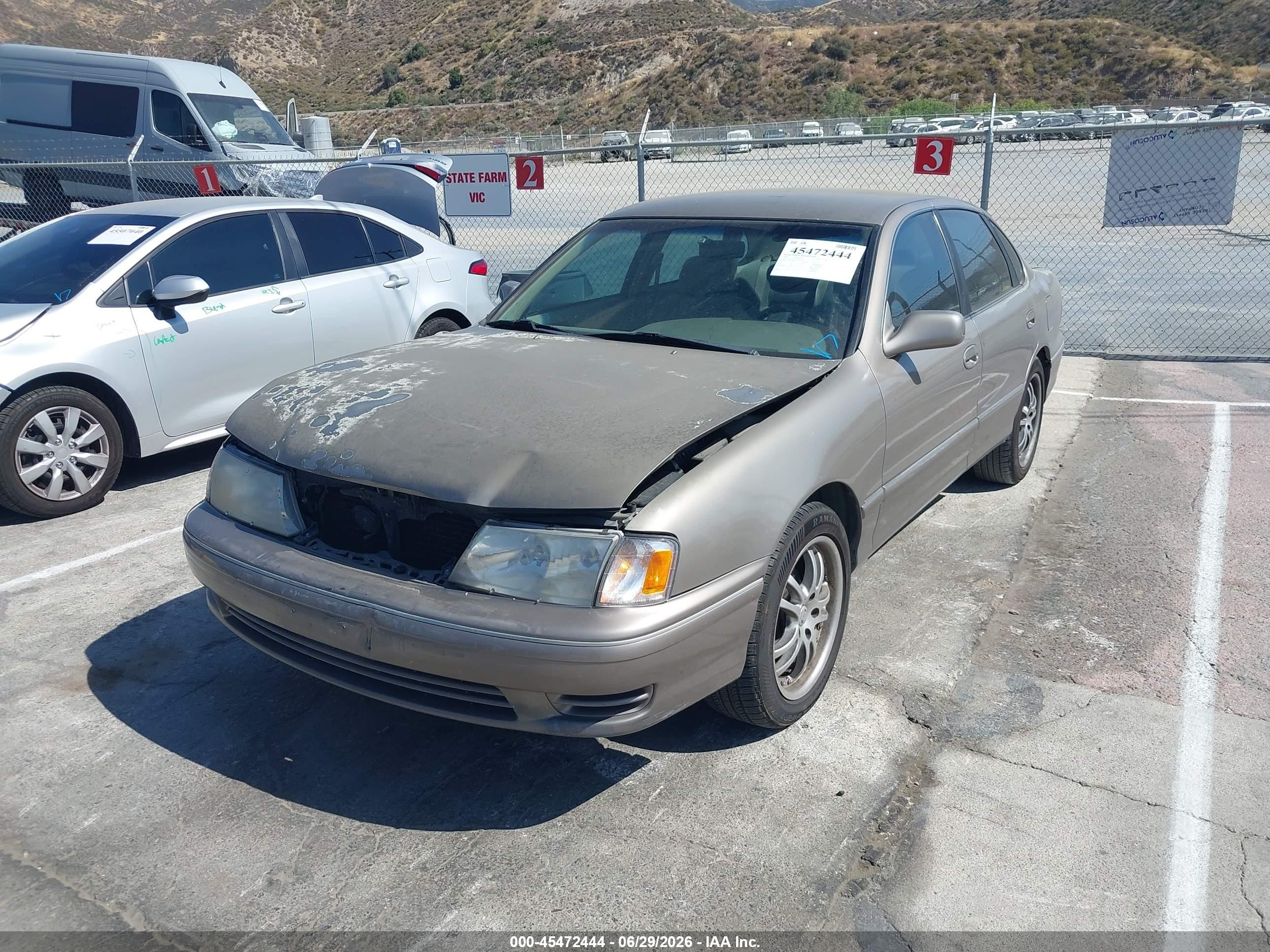 1998 Toyota Avalon Xl Tan vin: 4T1BF18B7WU240078