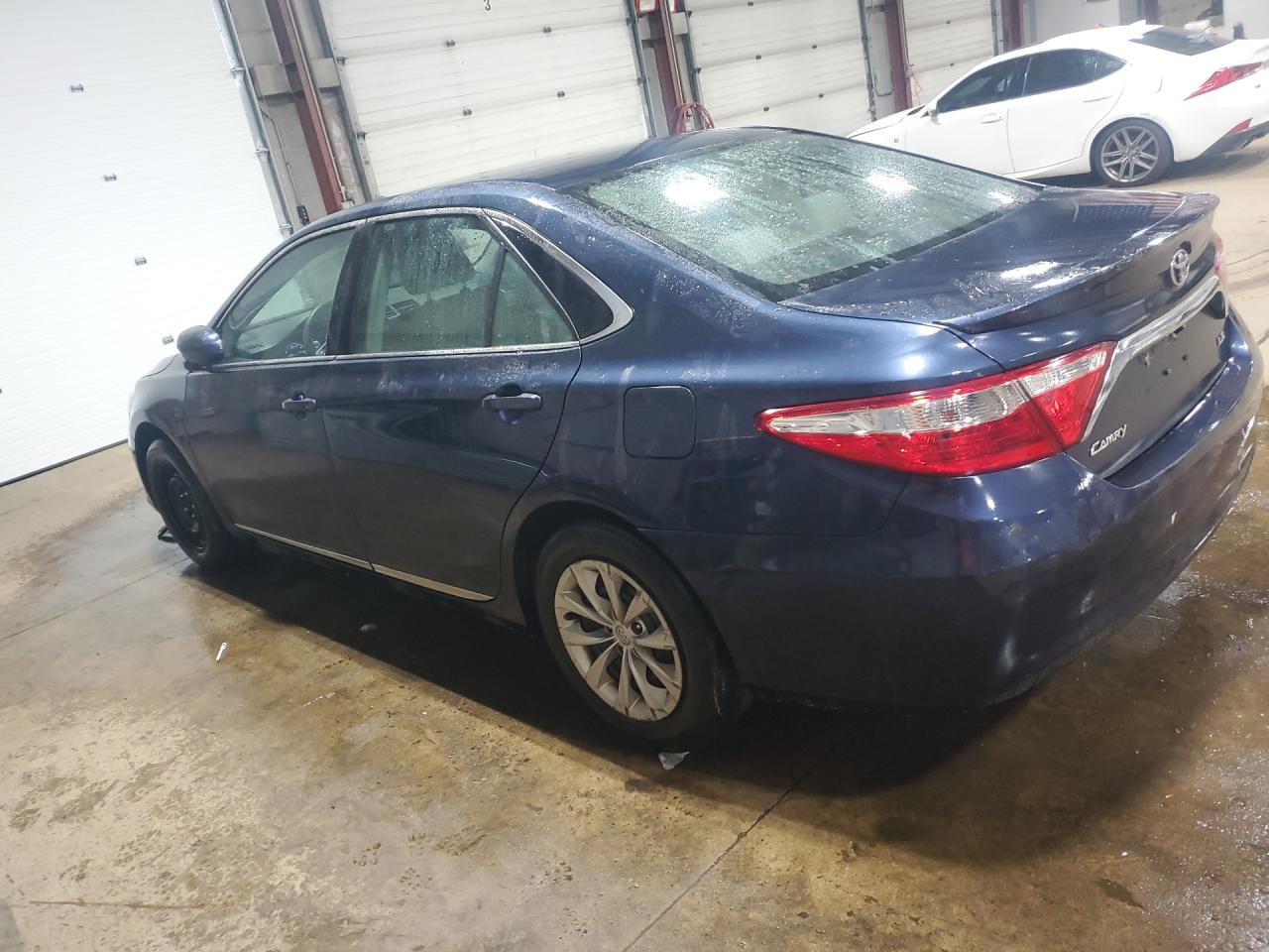 2017 Toyota Camry Le Blue vin: 4T1BF1FK2HU675516 Damage: Left Qtr Panel, Dent(S) W/ Paint Dmg, 1 To 2 Inches