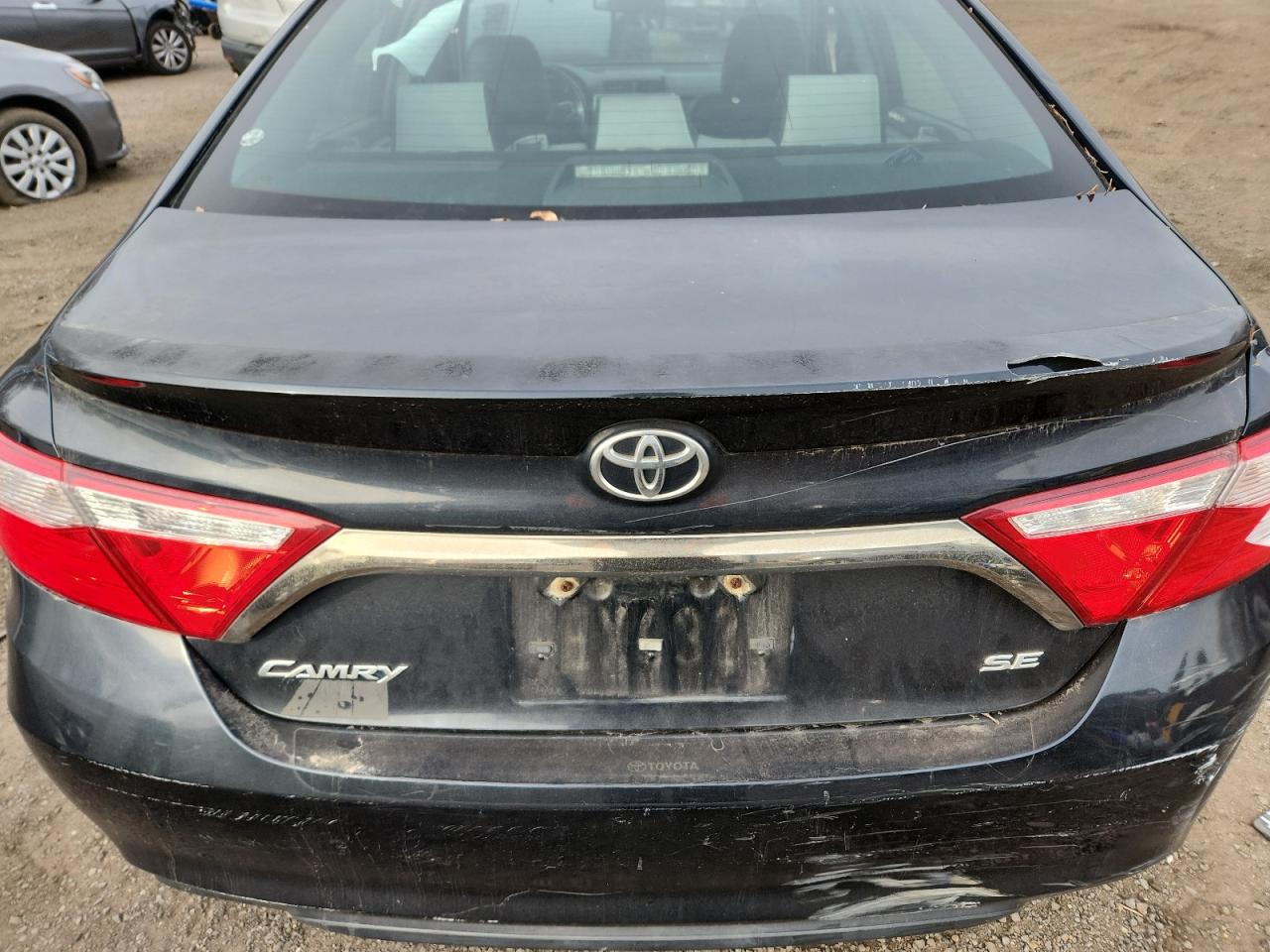 2015 Toyota Camry Le Черный vin: 4T1BF1FK7FU010592 Damage: Deck Lid, Dent(S) W/ Paint Dmg, 1 To 2 Inches