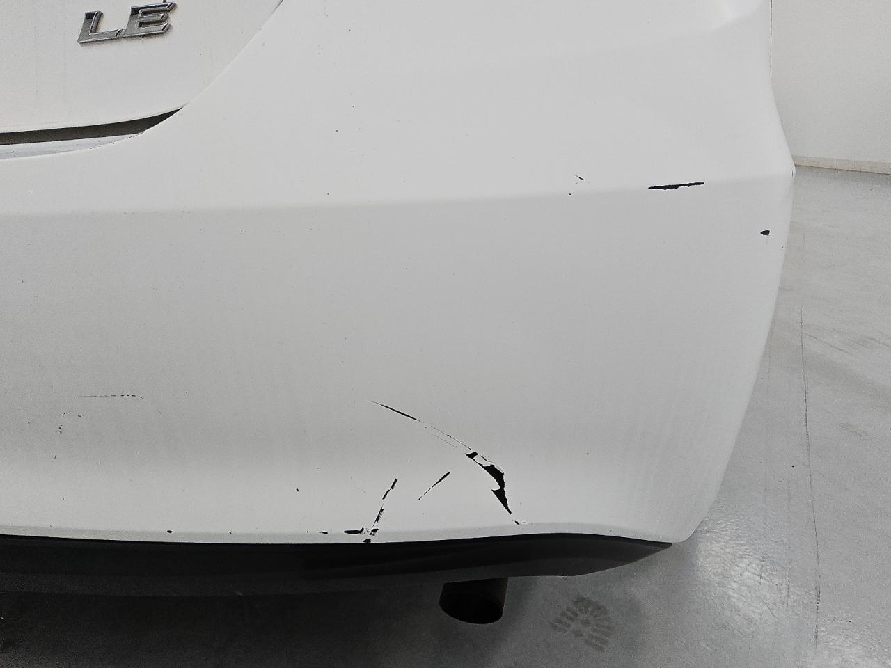 2015 Toyota Camry Le White vin: 4T1BF1FK7FU982029 Damage: Rear Bumper, Peeling, 3 To 4 Inches