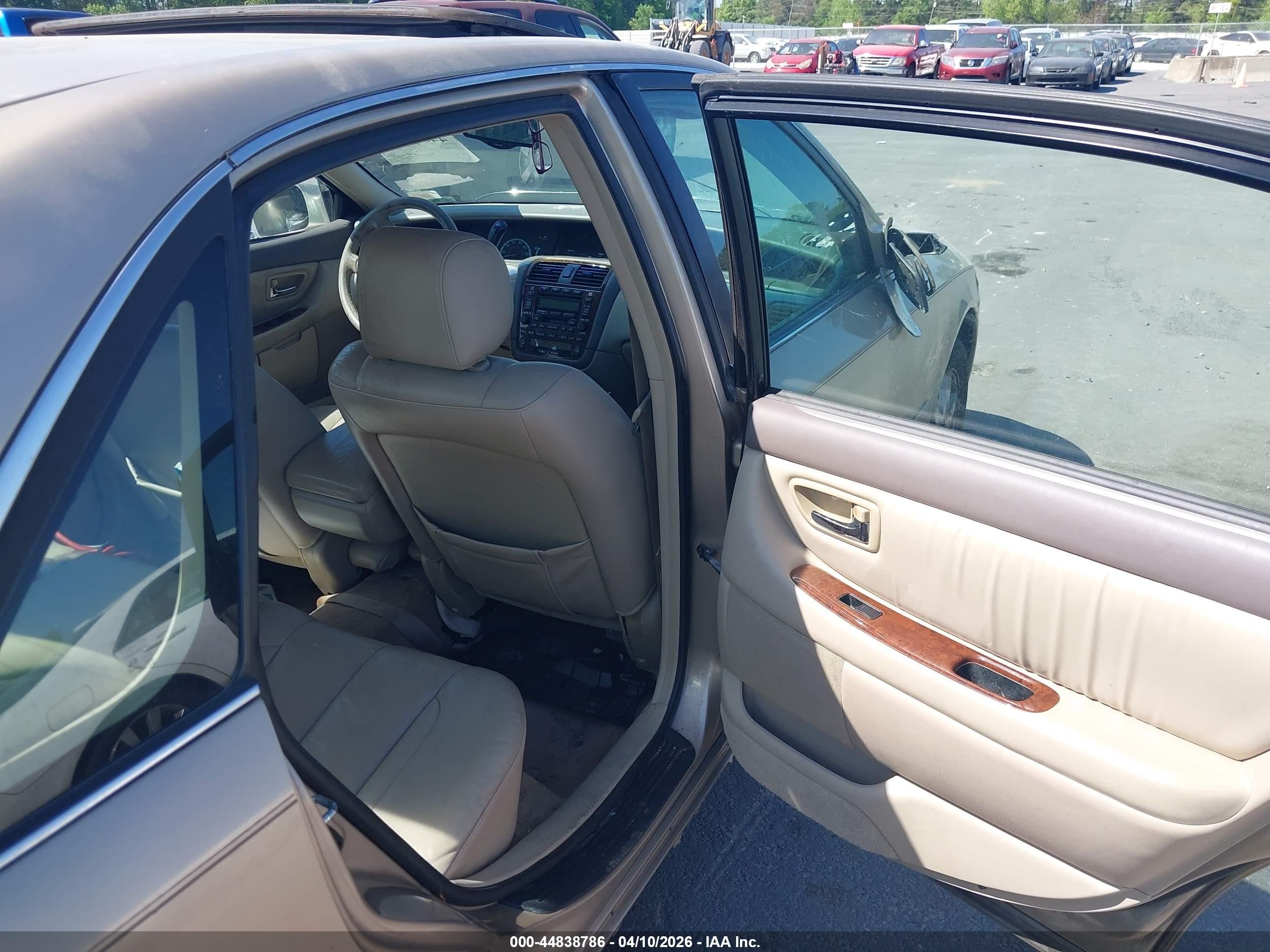 2001 Toyota Avalon Xls Золотой vin: 4T1BF28B91U174860