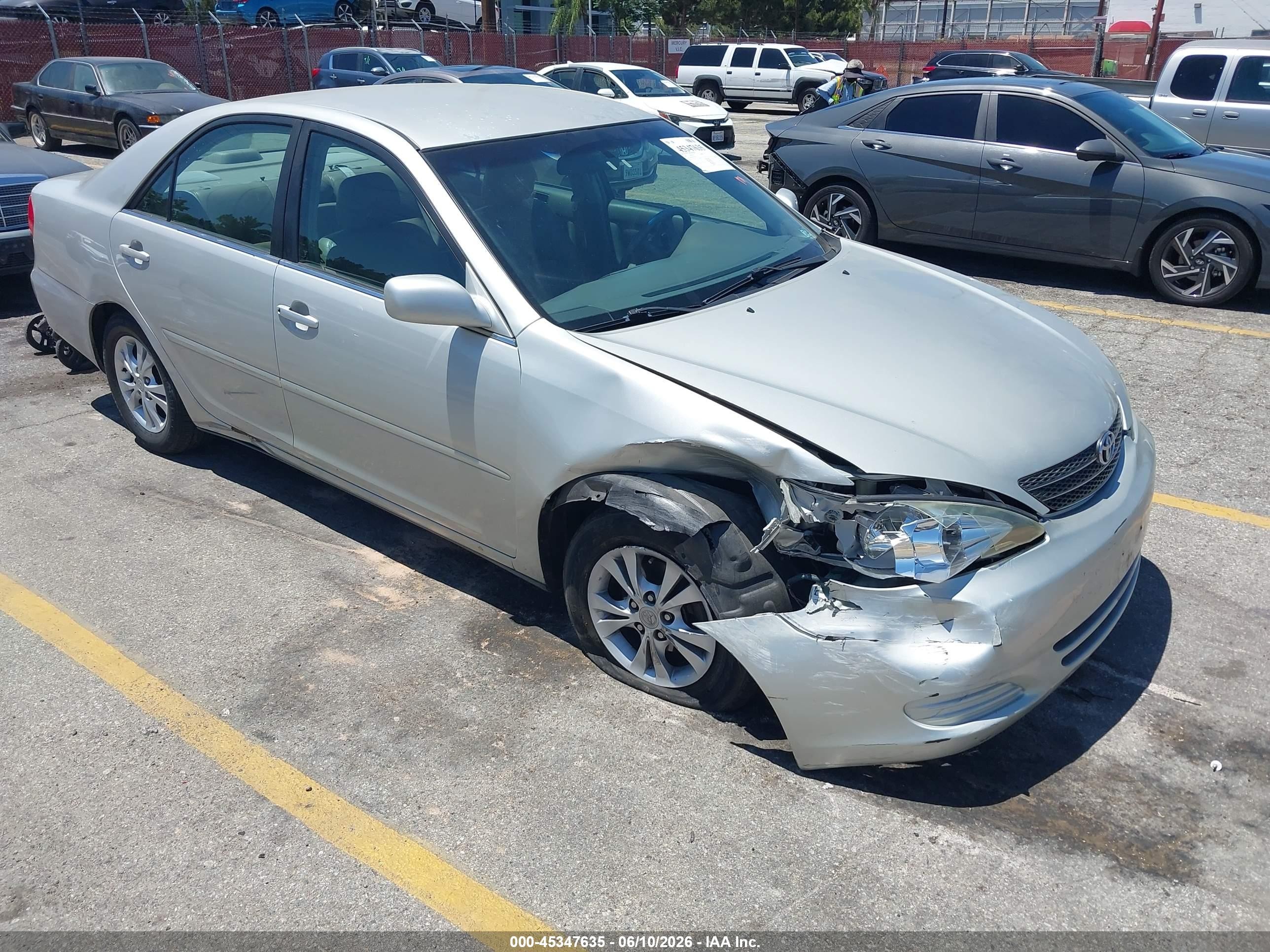 2003 Toyota Camry Le V6 Champagne vin: 4T1BF32K33U562524