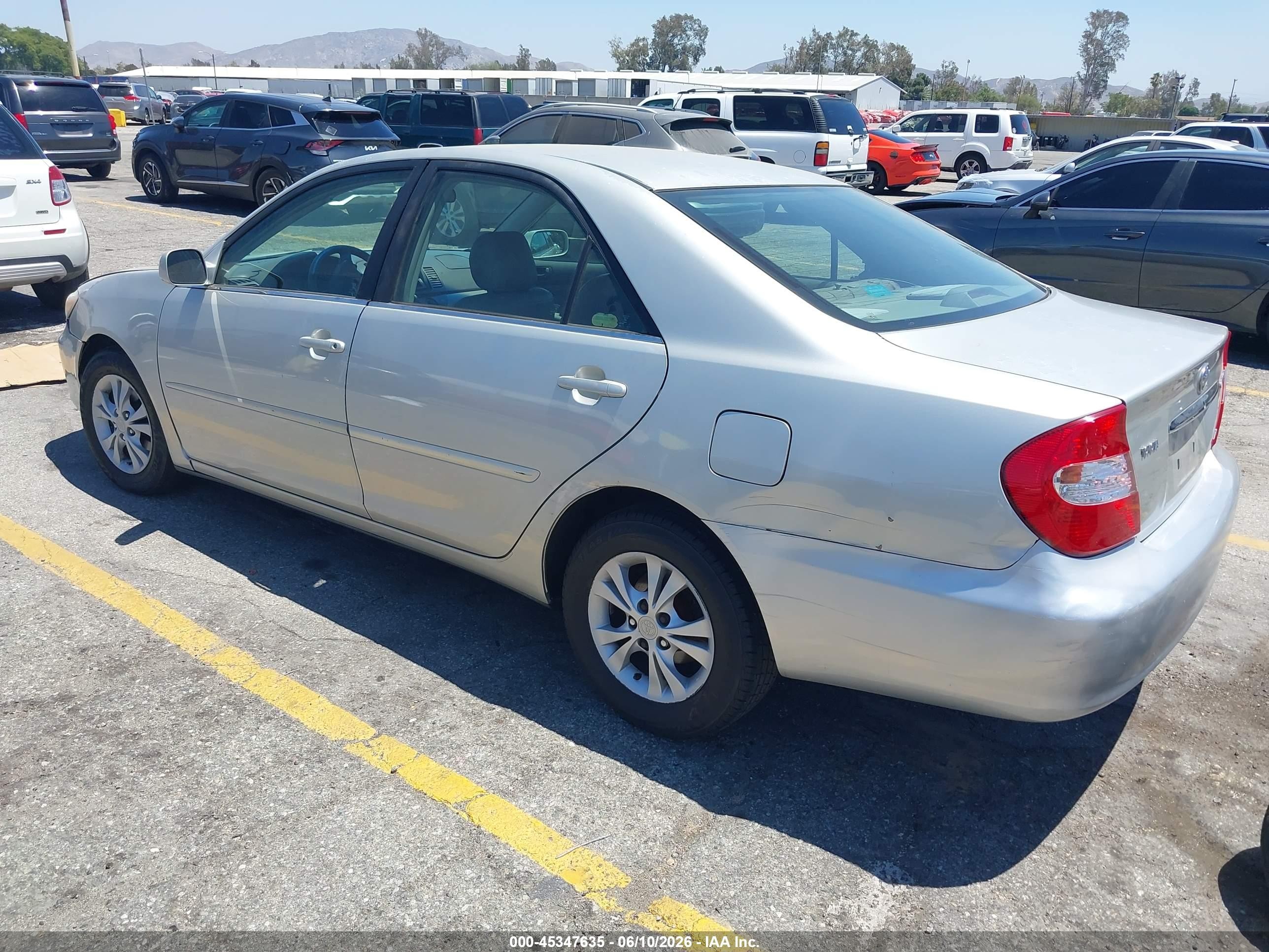 2003 Toyota Camry Le V6 Champagne vin: 4T1BF32K33U562524