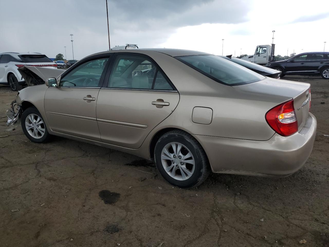 2004 Toyota 06 Bedlnr Gold vin: 4T1BF32K34U577056