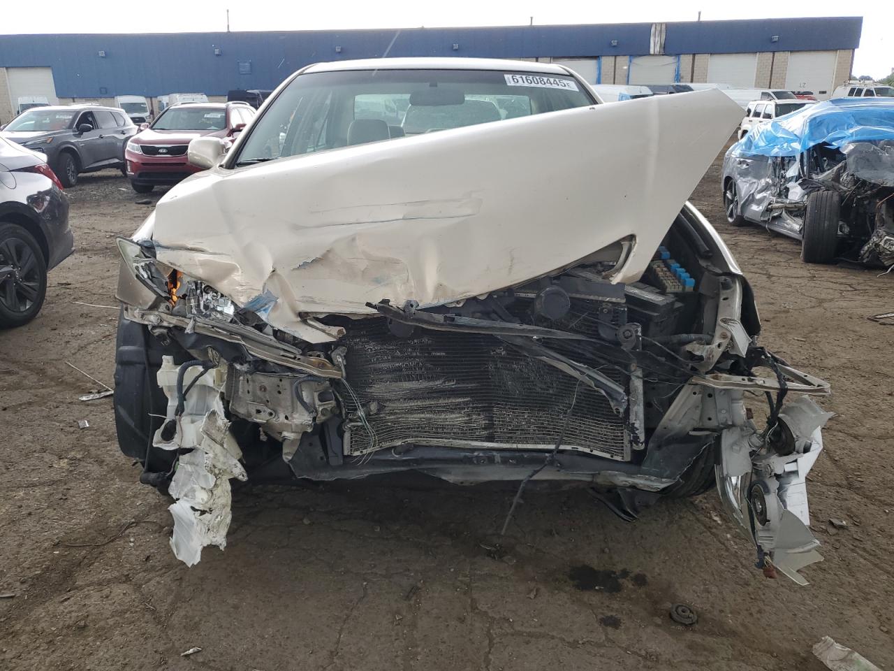 2004 Toyota 06 Bedlnr Gold vin: 4T1BF32K34U577056
