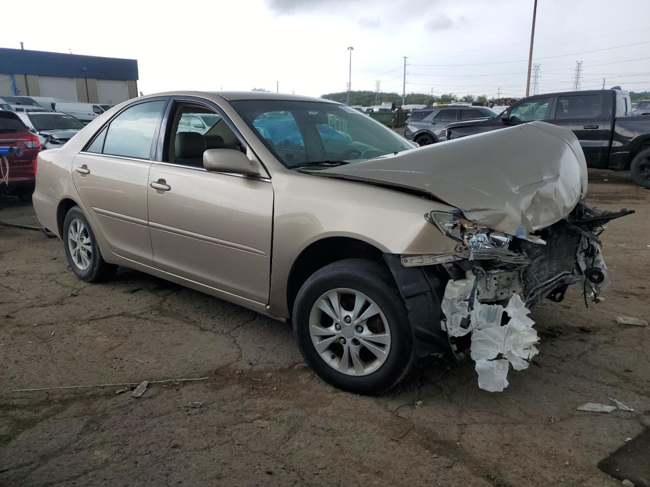 2004 Toyota 06 Bedlnr Gold vin: 4T1BF32K34U577056