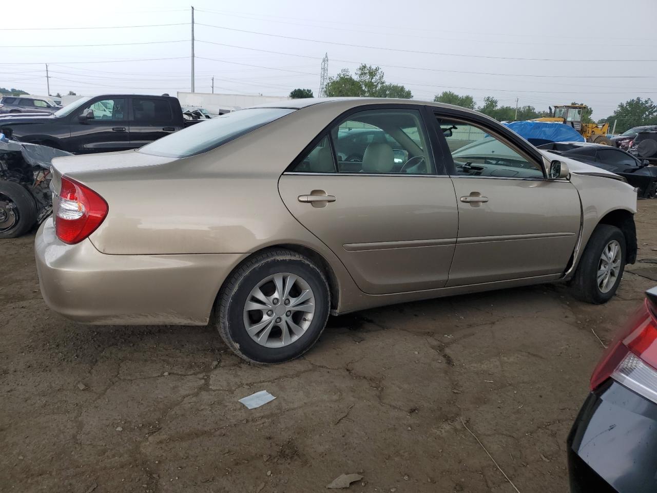 2004 Toyota 06 Bedlnr Gold vin: 4T1BF32K34U577056