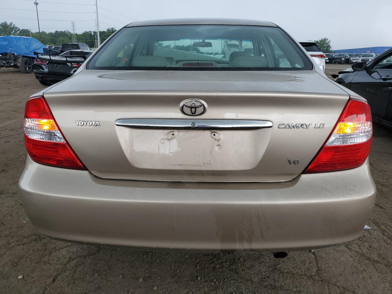 2004 Toyota 06 Bedlnr Gold vin: 4T1BF32K34U577056
