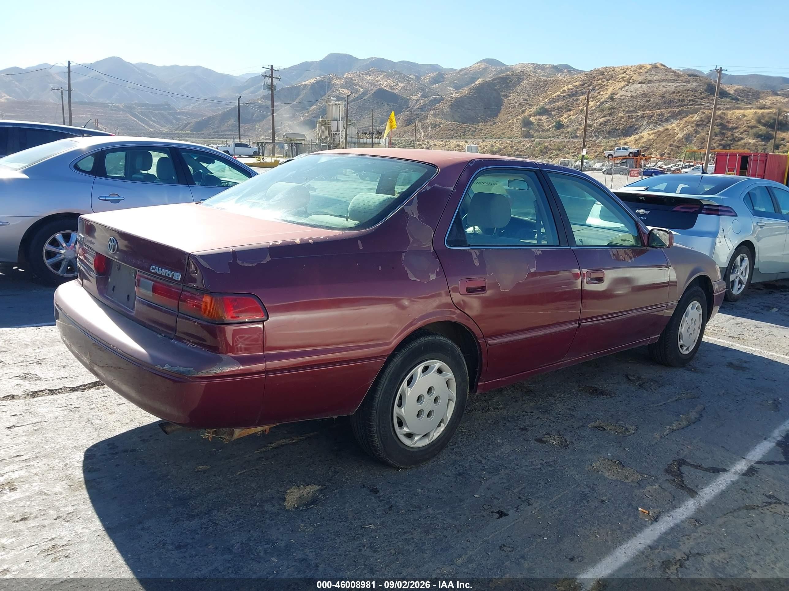 1997 Toyota Camry Le Red vin: 4T1BG22K9VU010925