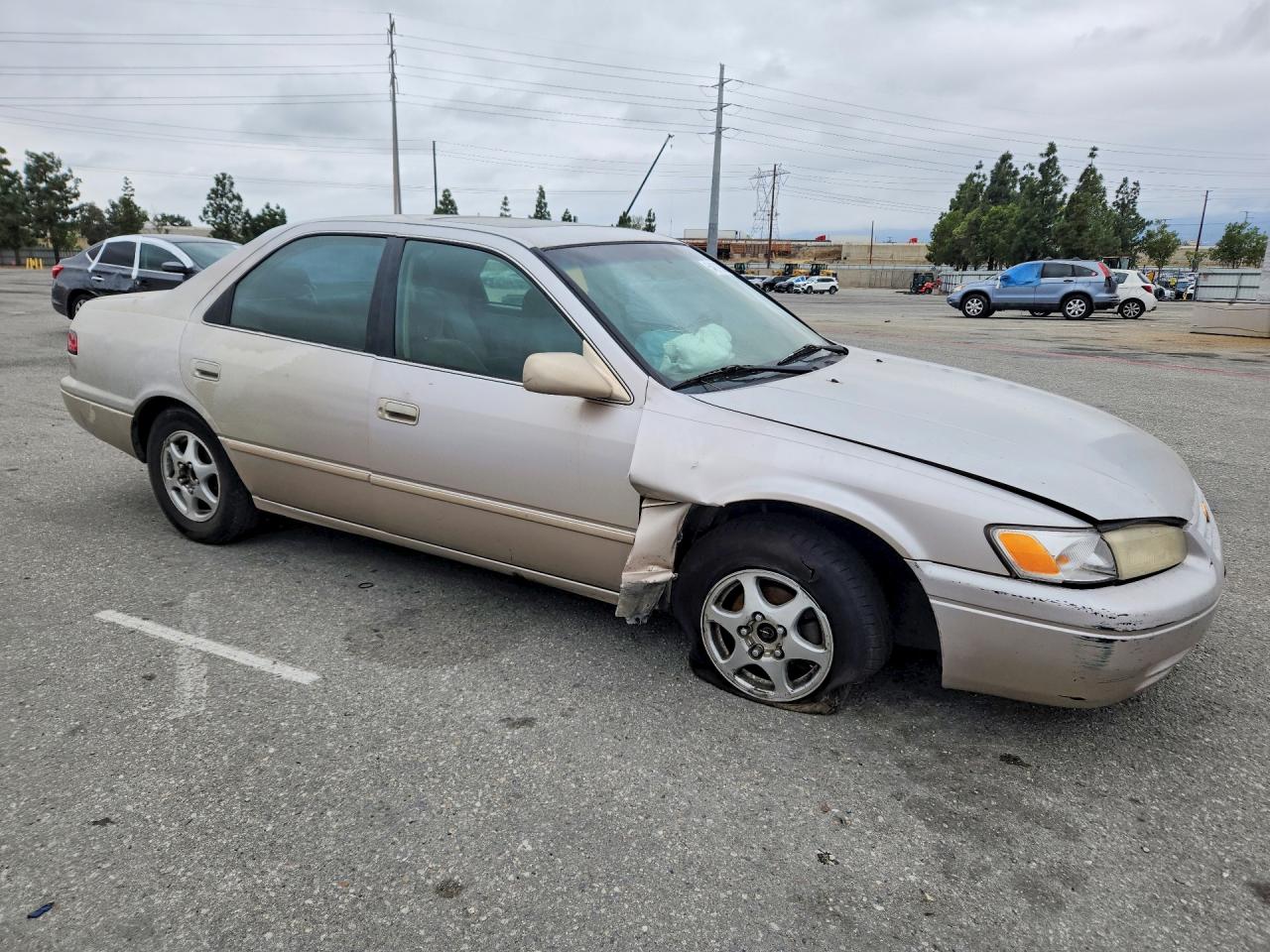 1997 Toyota Camry Le Beige vin: 4T1BG22KXVU075976