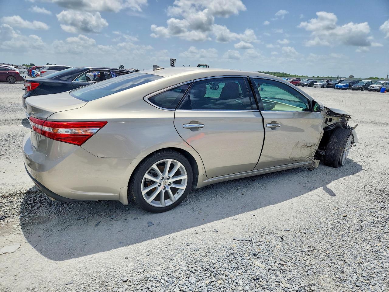 2014 Toyota Avalon Limited Золотой vin: 4T1BK1EB7EU095641