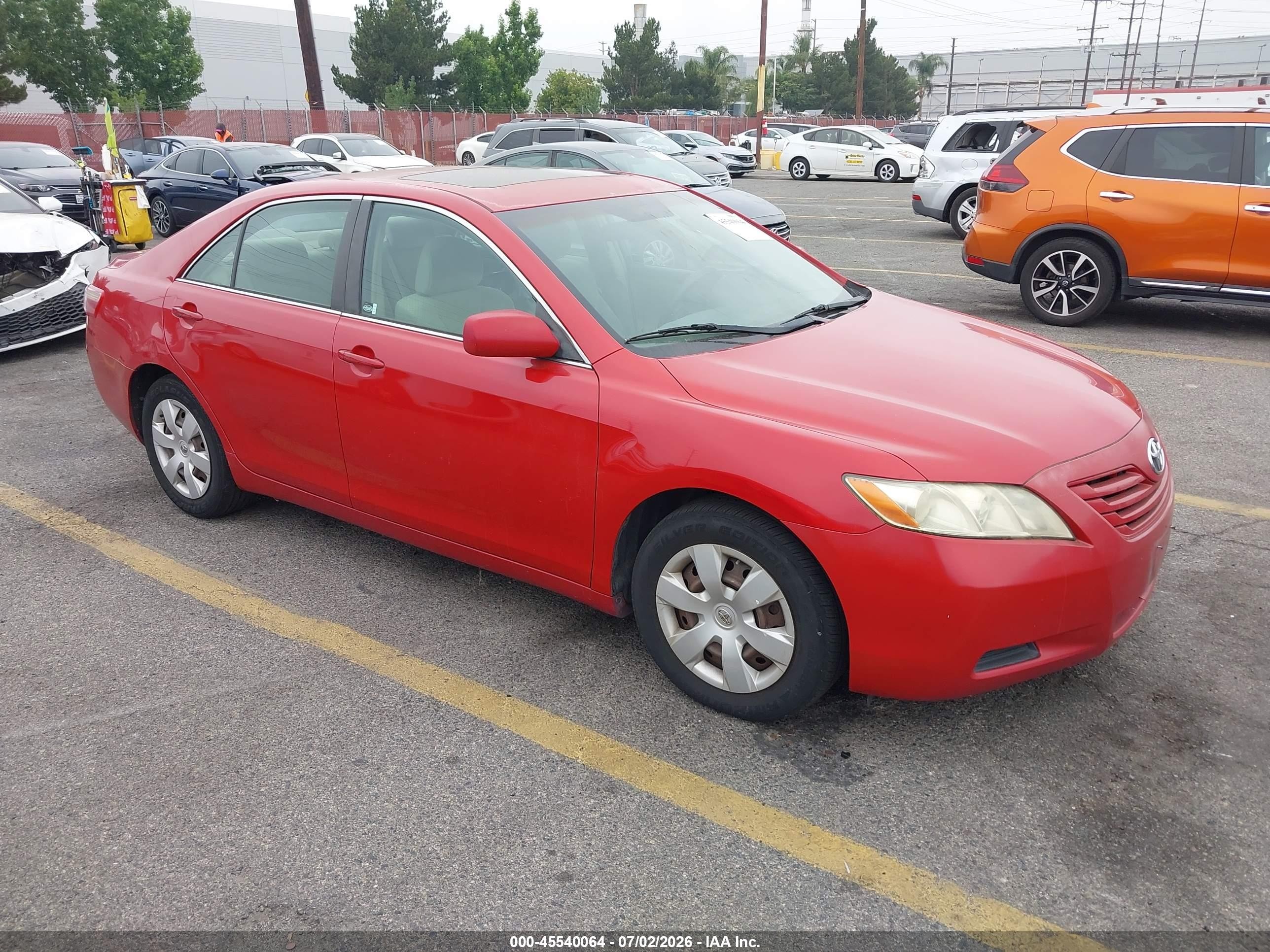 2007 Toyota Camry Le V6 Red vin: 4T1BK46KX7U021651