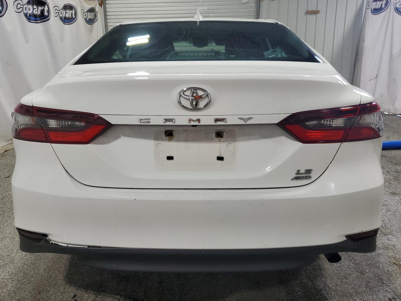2023 Toyota Camry Le White vin: 4T1C11BK2PU096890 Damage: Rear Bumper Molding, Broken, Replacement Required