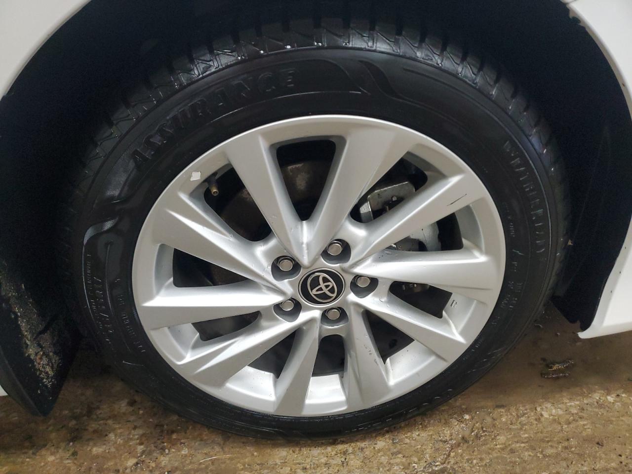 2023 Toyota Camry Le White vin: 4T1C11BK3PU092847 Damage: Right Front Wheel, Multiple Scratches Heavy, 2
