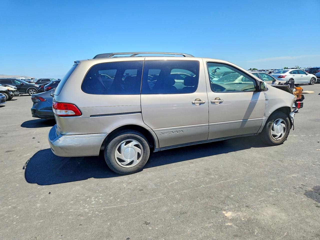 2003 Toyota Sienna Xle Tan vin: 4T3ZF13C13U511122