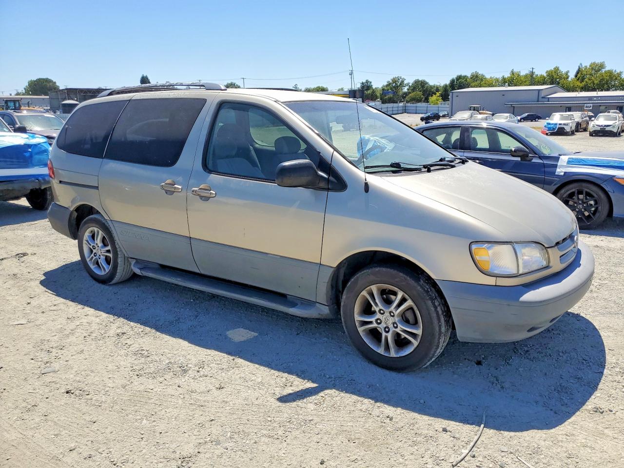 2000 Toyota Sienna Le Tan vin: 4T3ZF13C1YU230722