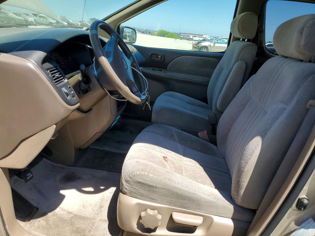 2000 Toyota Sienna Le Tan vin: 4T3ZF13C1YU230722