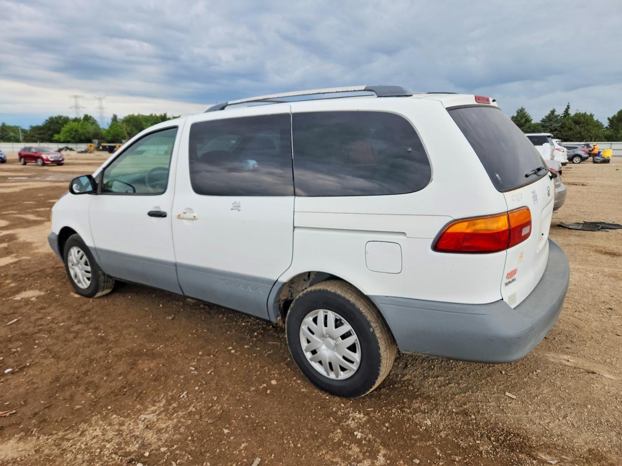 2000 Toyota Sienna Le White vin: 4T3ZF13C2YU246556
