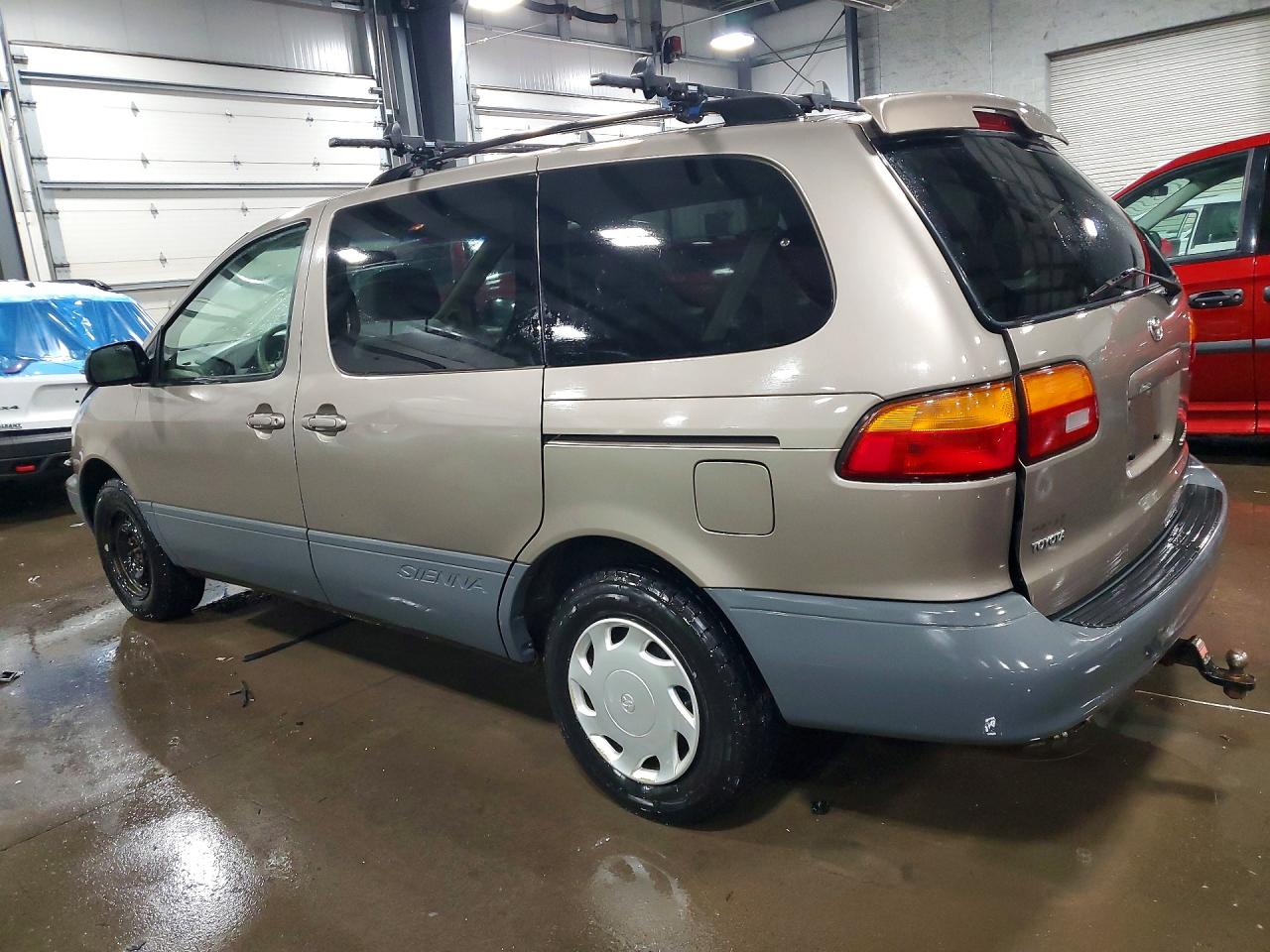 1999 Toyota Sienna Le Tan vin: 4T3ZF13C6XU093193
