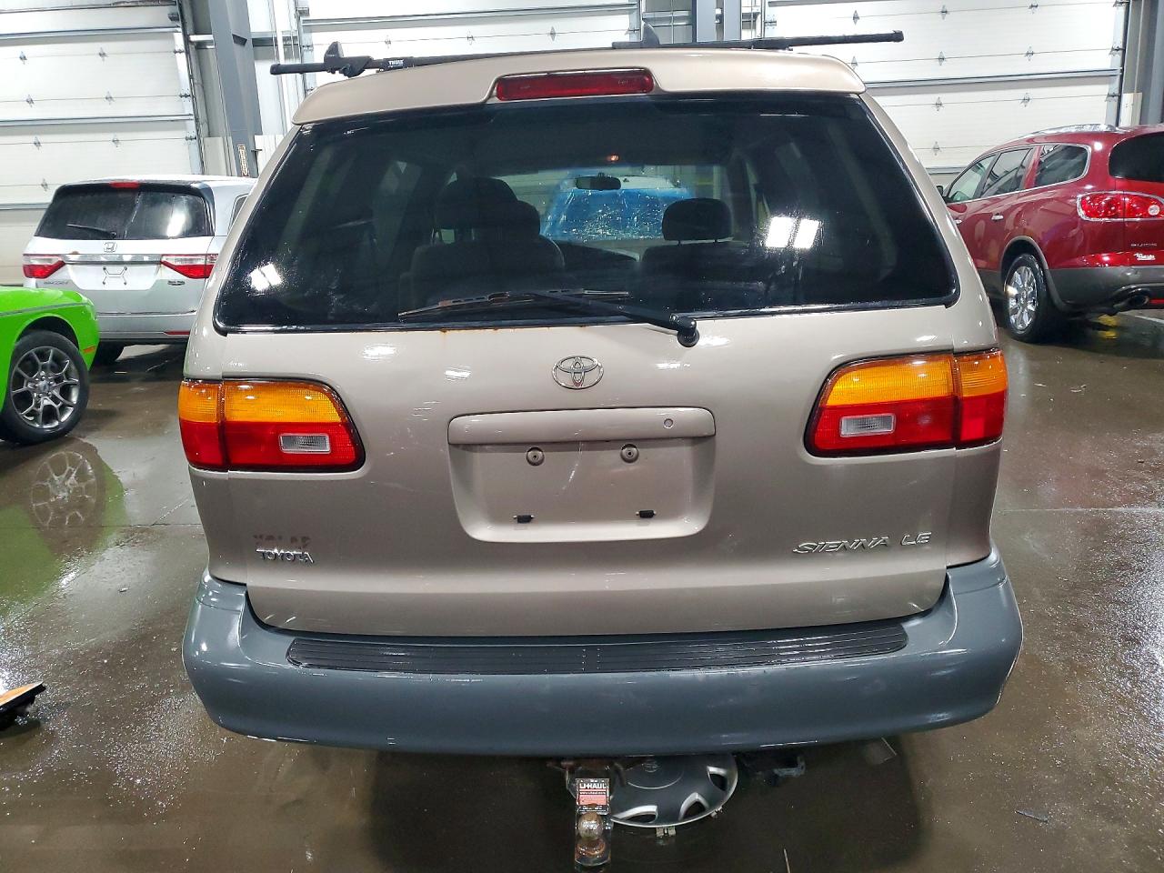 1999 Toyota Sienna Le Tan vin: 4T3ZF13C6XU093193