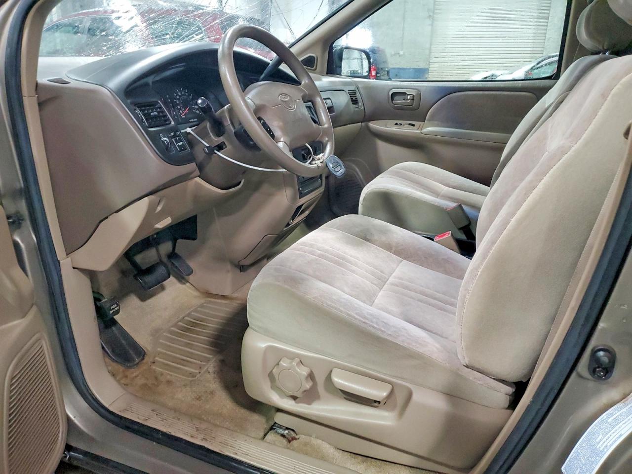 1999 Toyota Sienna Le Tan vin: 4T3ZF13C6XU093193