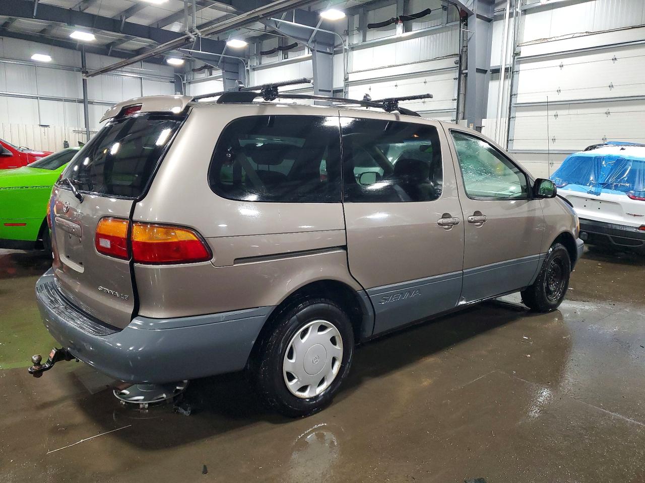 1999 Toyota Sienna Le Tan vin: 4T3ZF13C6XU093193
