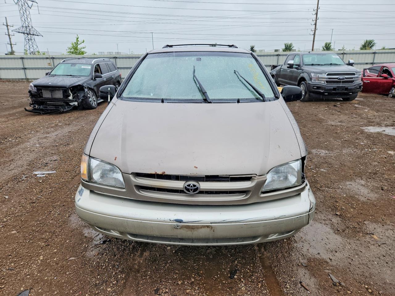 1999 Toyota Sienna Xle Tan vin: 4T3ZF13C6XU161752