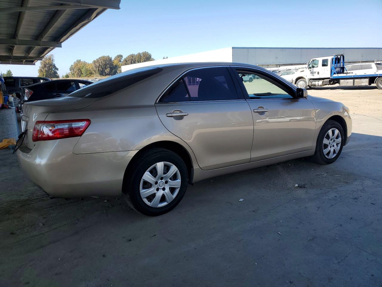 2009 Toyota Camry Le Tan vin: 4T4BE46K19R099851
