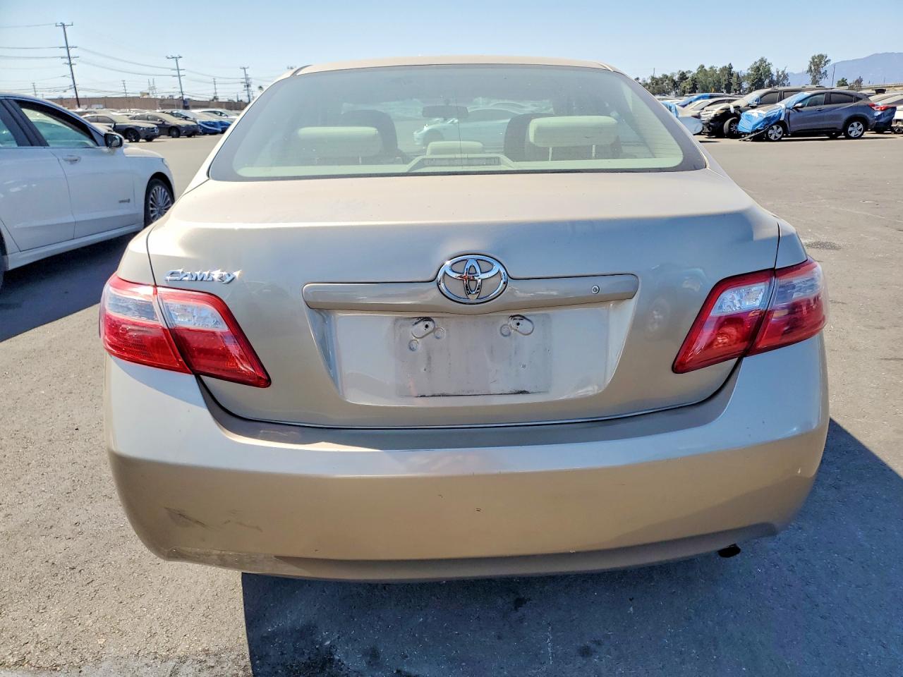 2009 Toyota Camry Base Tan vin: 4T4BE46K29R050769