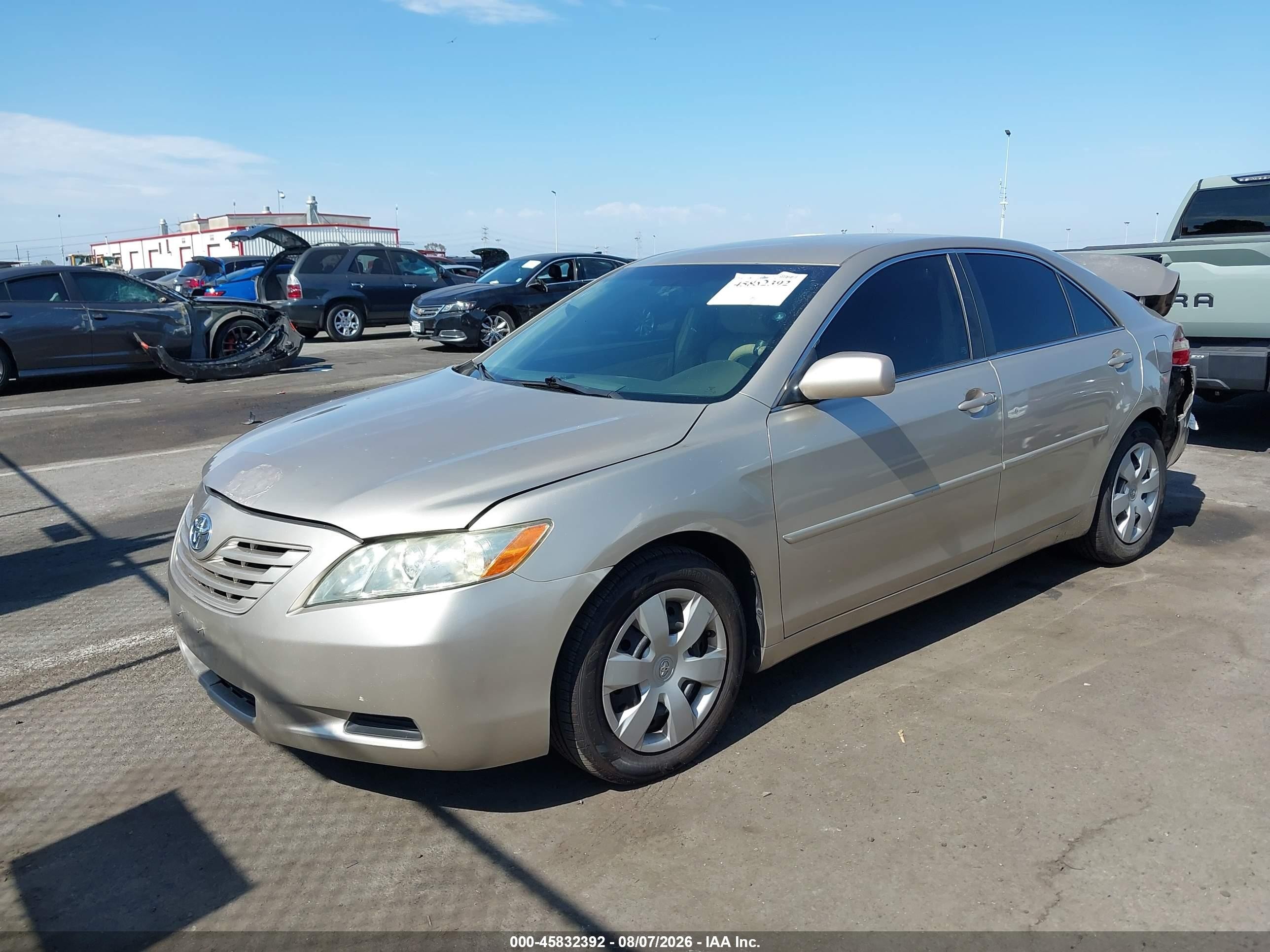 2009 Toyota Camry Le Gold vin: 4T4BE46K29R133277