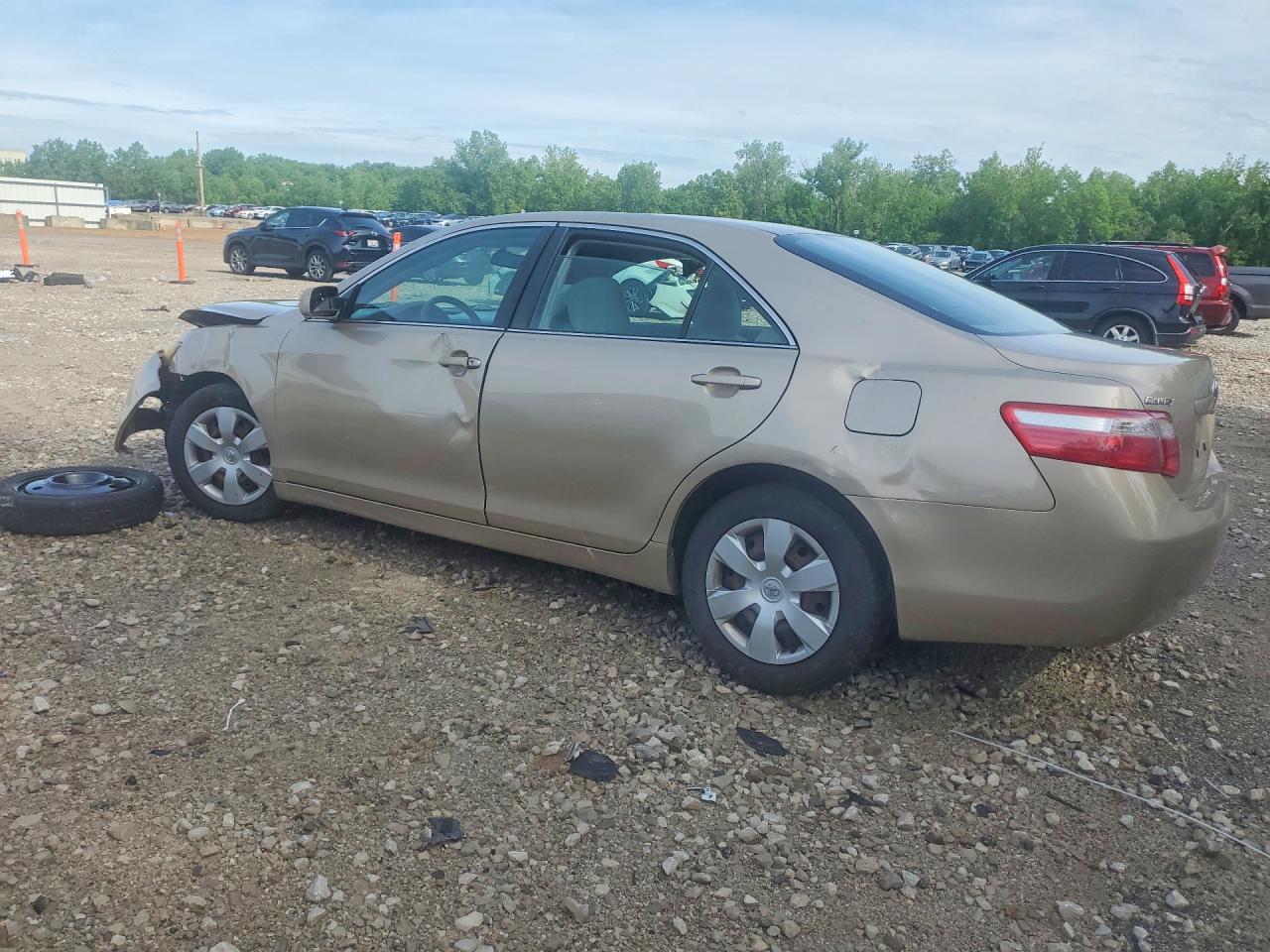 2009 Toyota Camry Le Gold vin: 4T4BE46K39R059206
