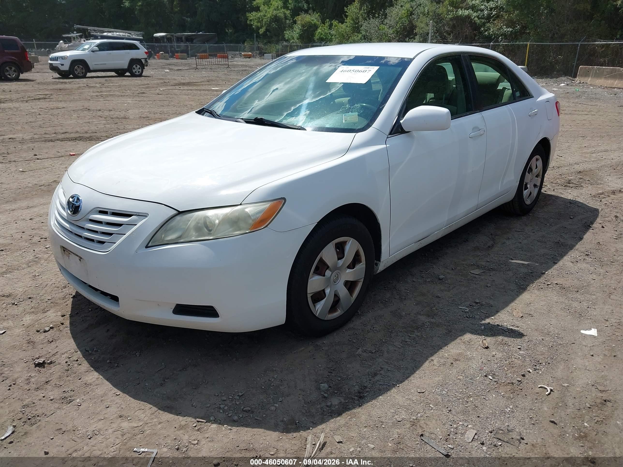 2009 Toyota Camry   White vin: 4T4BE46K59R073821