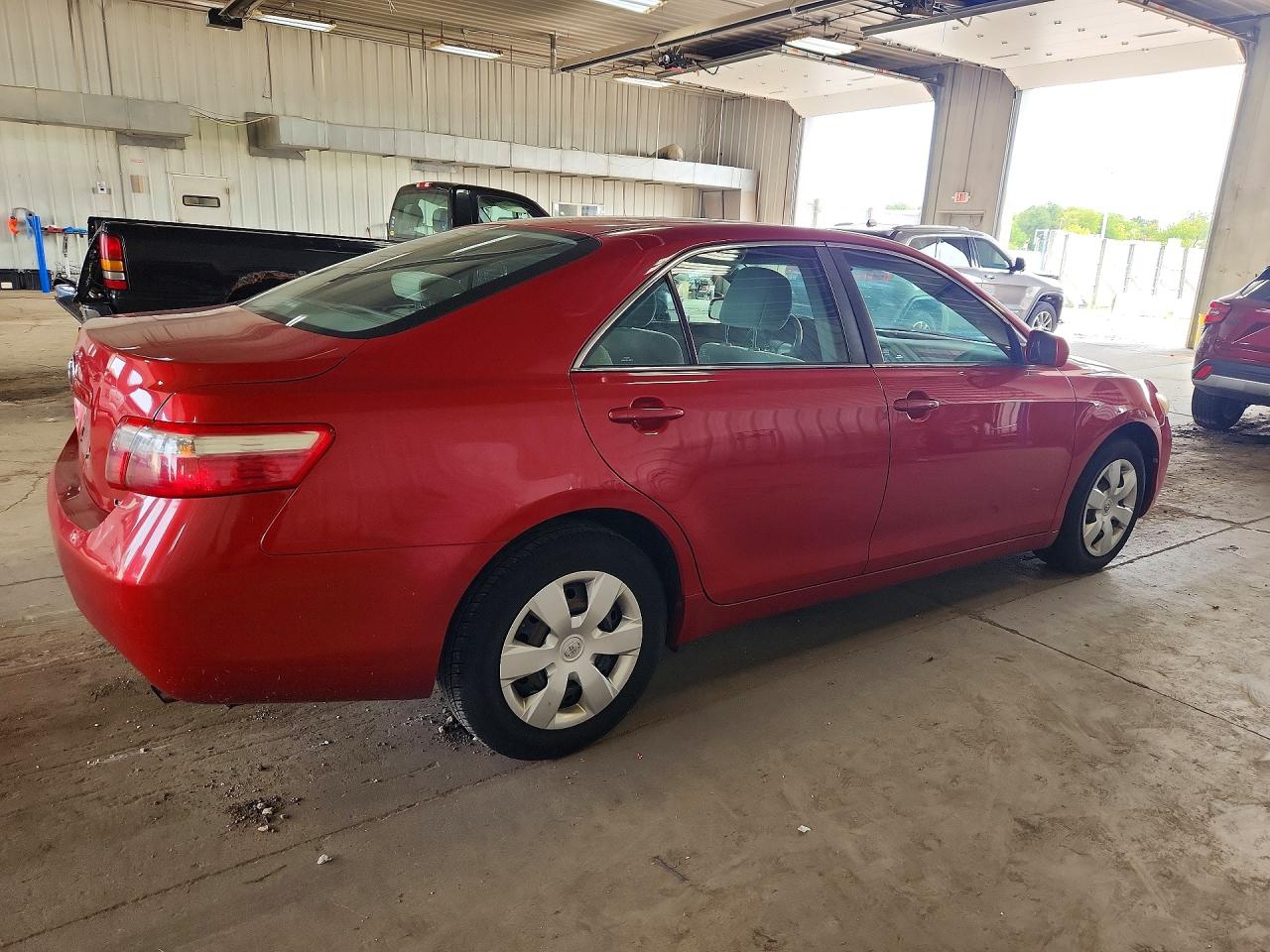 2009 Toyota Camry Le Red vin: 4T4BE46K59R135475