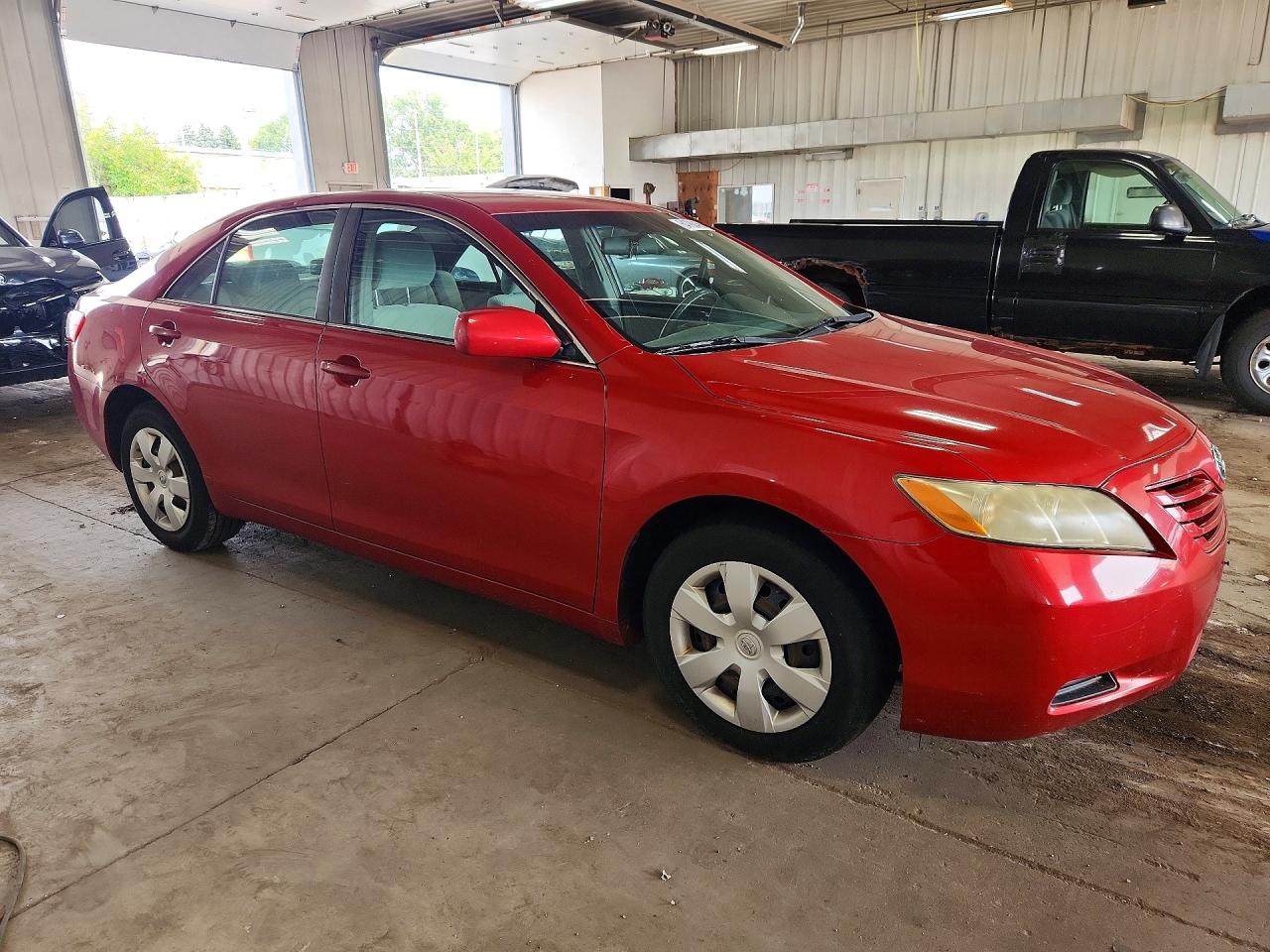 2009 Toyota Camry Le Red vin: 4T4BE46K59R135475