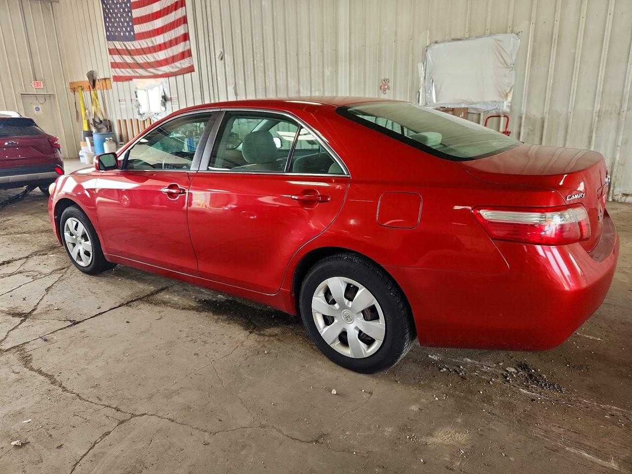 2009 Toyota Camry Le Red vin: 4T4BE46K59R135475