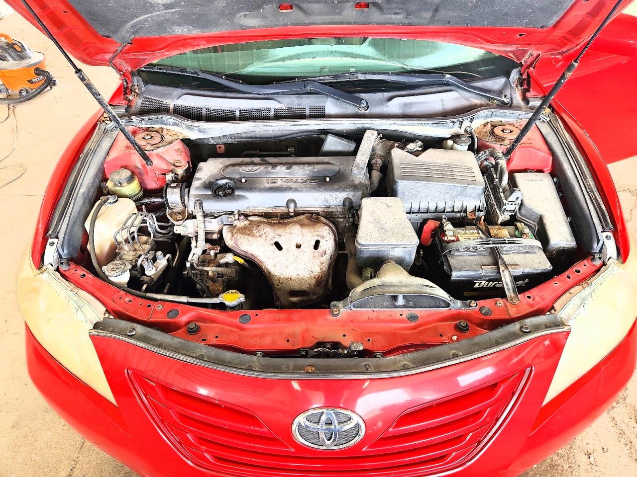 2009 Toyota Camry Le Red vin: 4T4BE46K59R135475