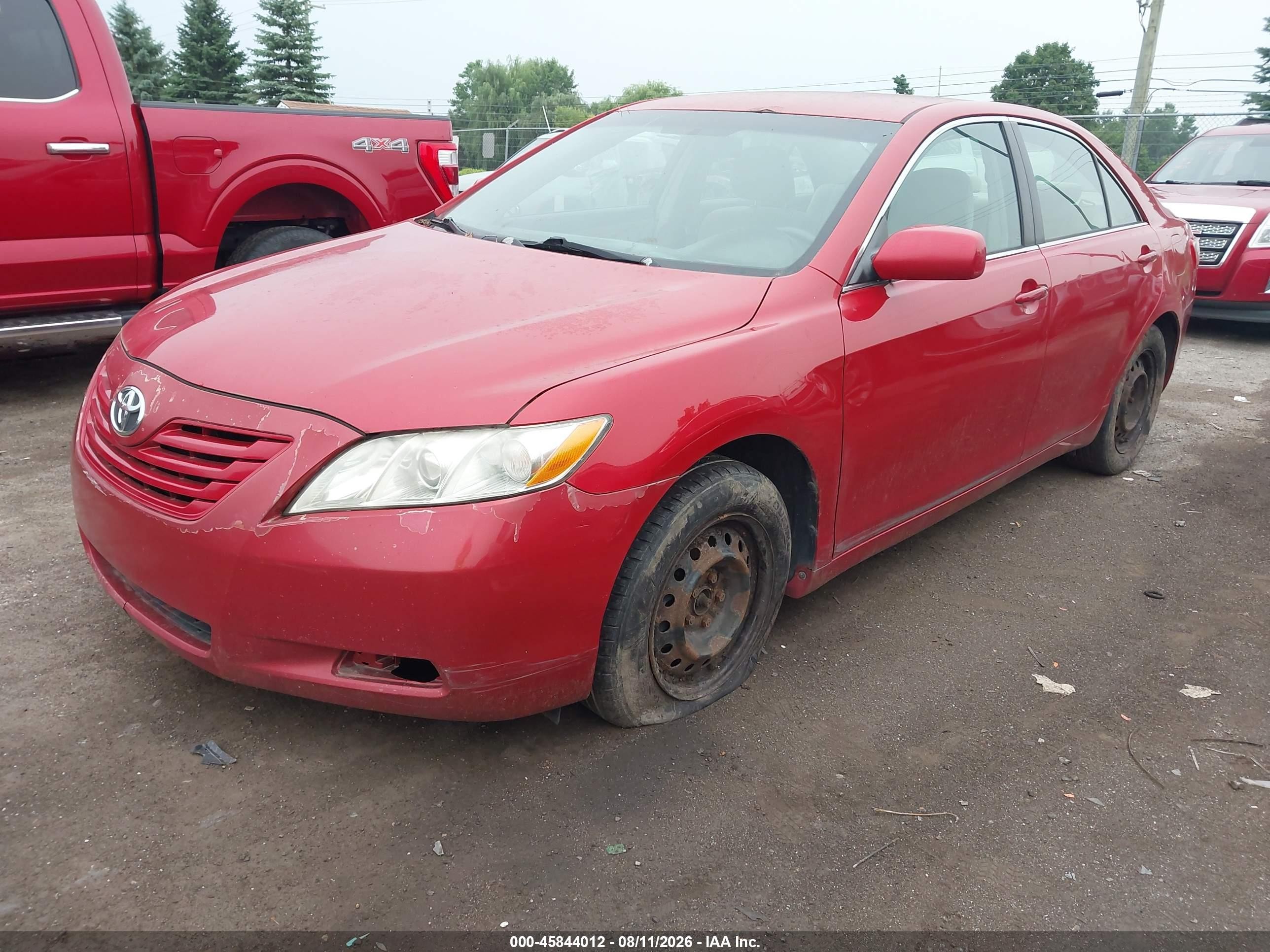 2009 Toyota Camry Le Red vin: 4T4BE46K69R090899