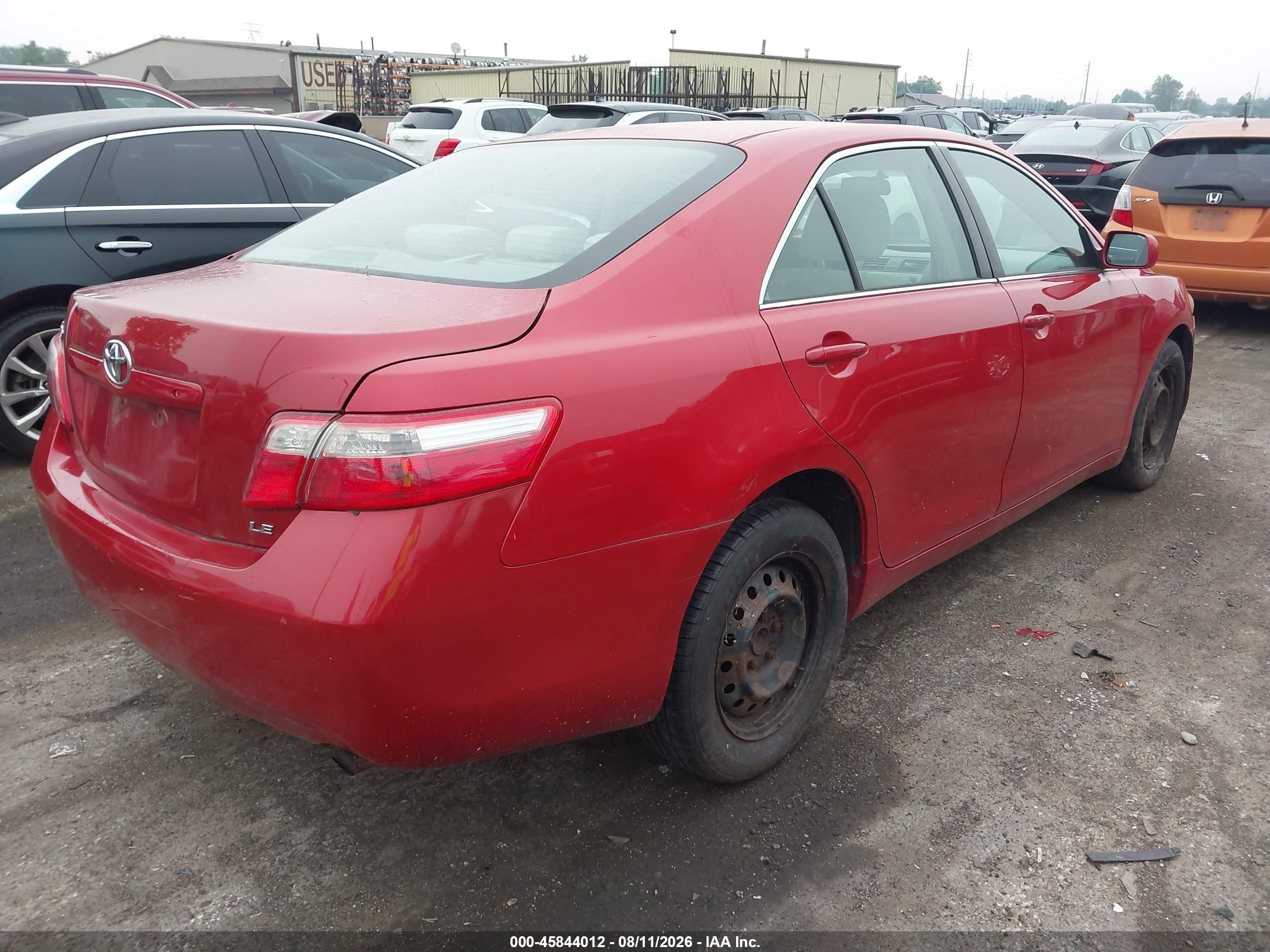 2009 Toyota Camry Le Red vin: 4T4BE46K69R090899