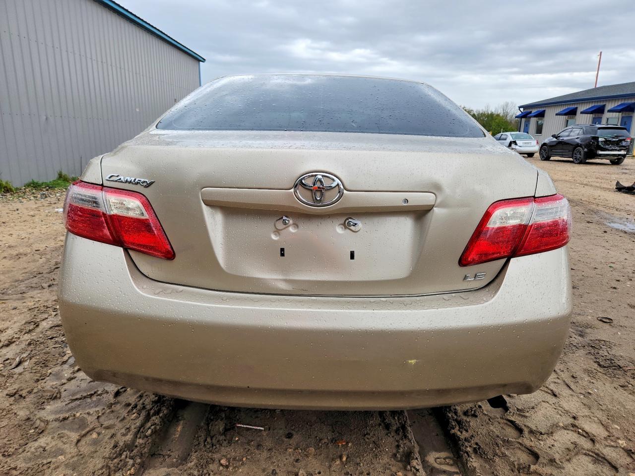 2009 Toyota Camry Le Золотой vin: 4T4BE46K99R057945