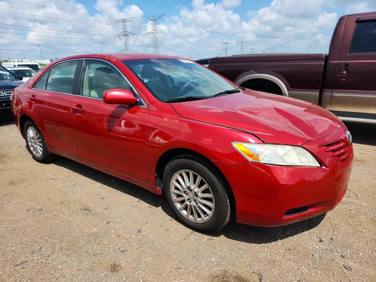 2009 Toyota Camry Le Red vin: 4T4BE46KX9R131809