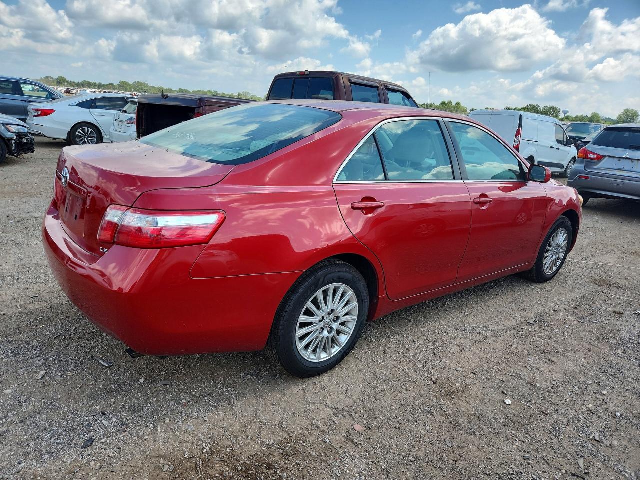 2009 Toyota Camry Le Red vin: 4T4BE46KX9R131809