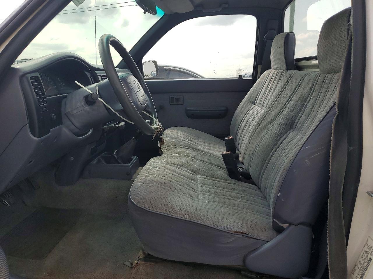 1999 Toyota Tacoma Base White vin: 4TANL42N4XZ471924