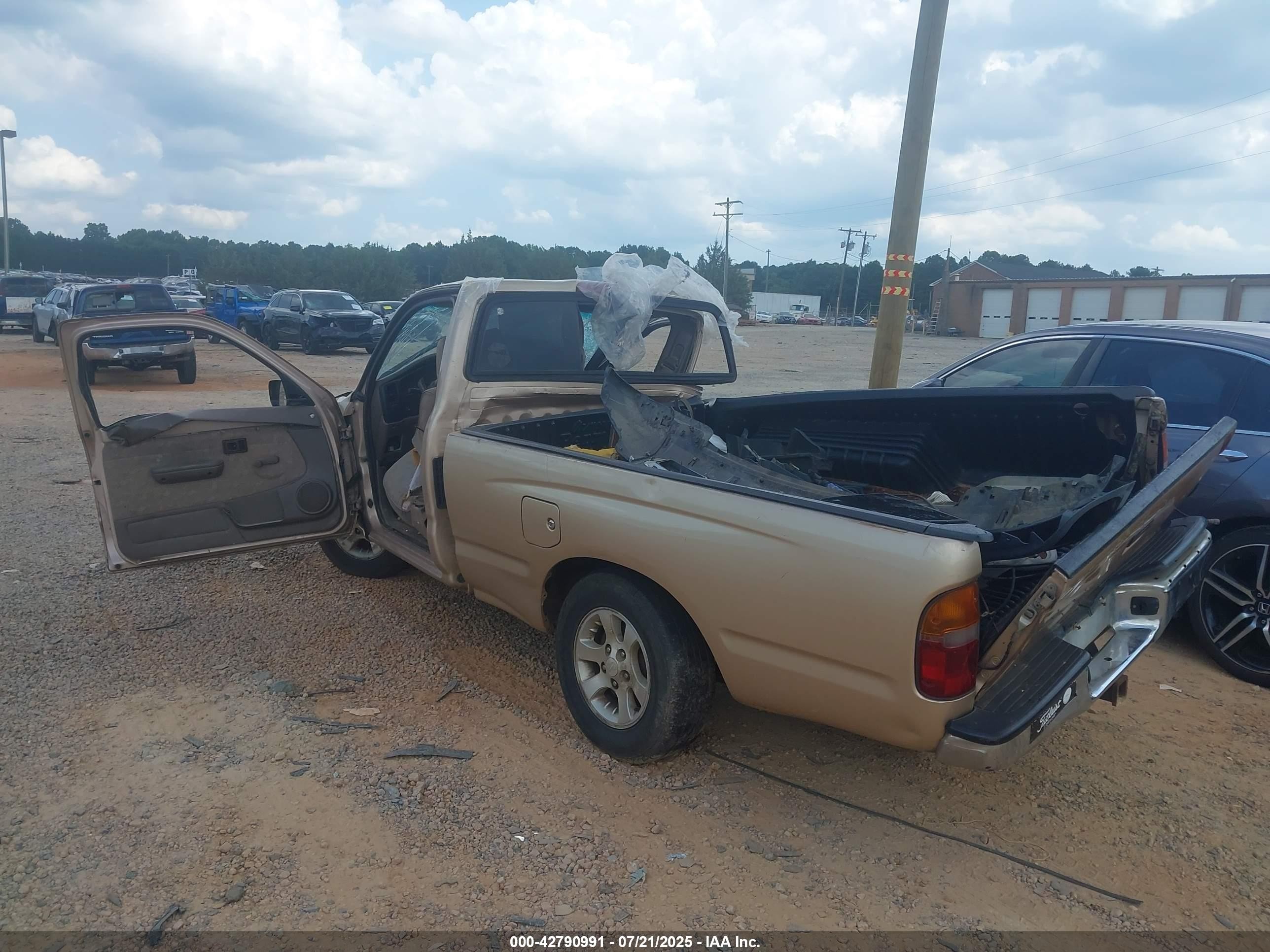 2000 Toyota Tacoma   Gold vin: 4TANL42N8YZ576340