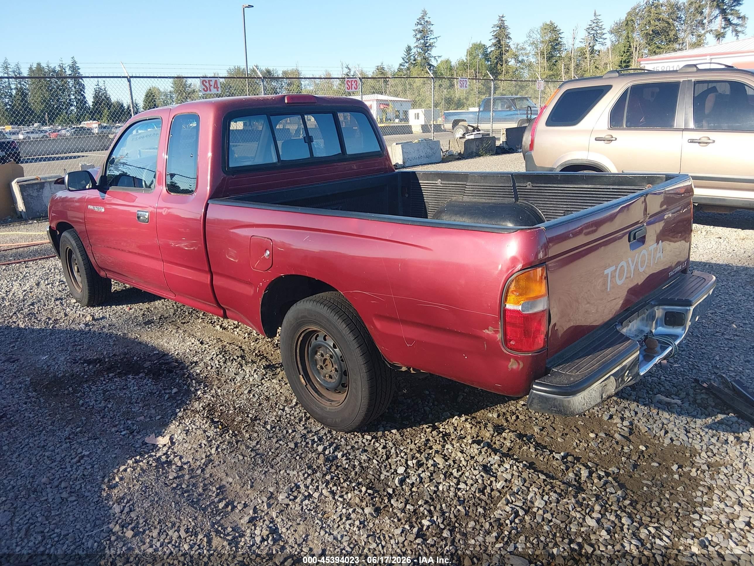 1997 Toyota Tacoma   Red vin: 4TAVL52N0VZ315575