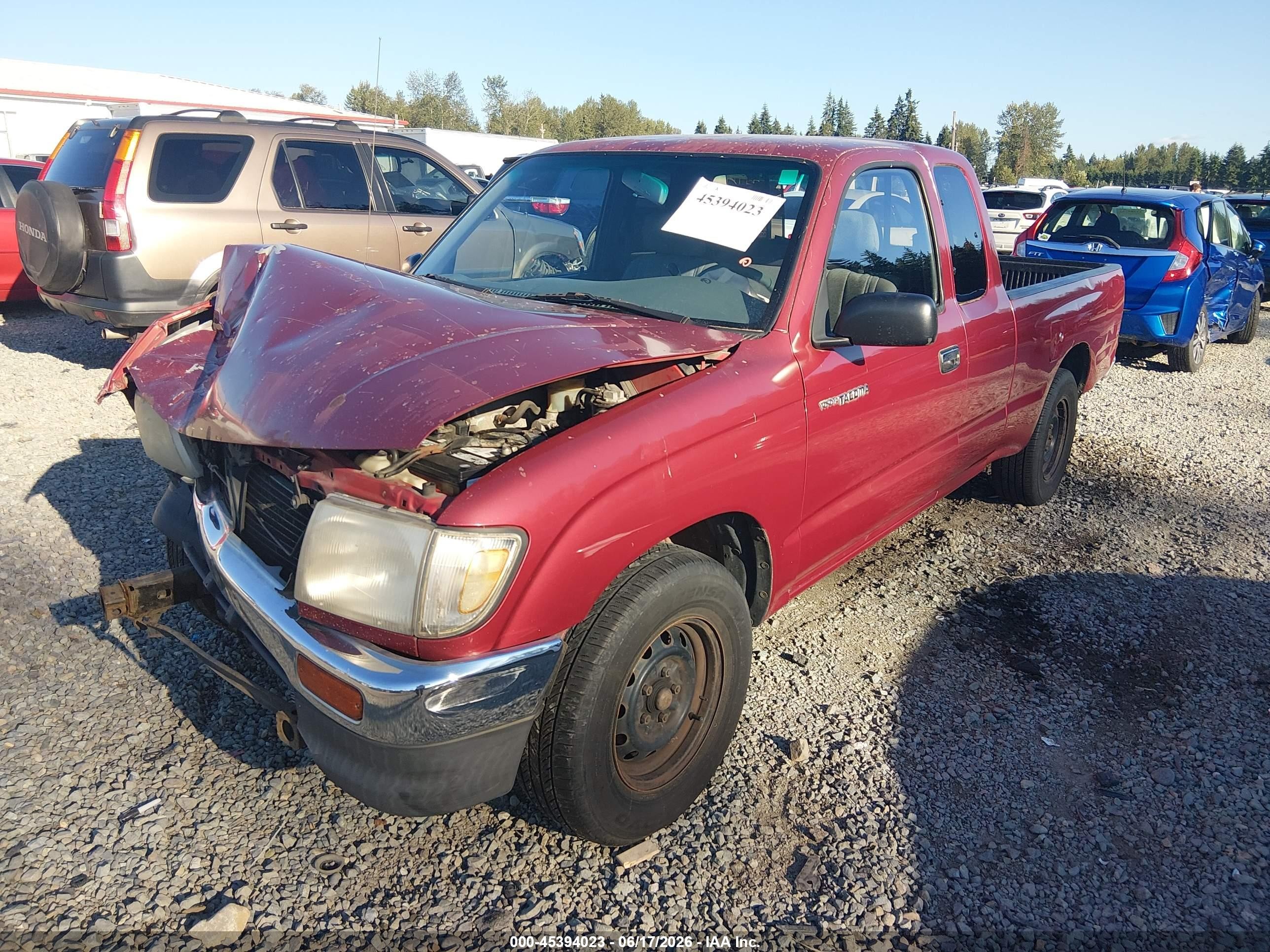 1997 Toyota Tacoma   Red vin: 4TAVL52N0VZ315575
