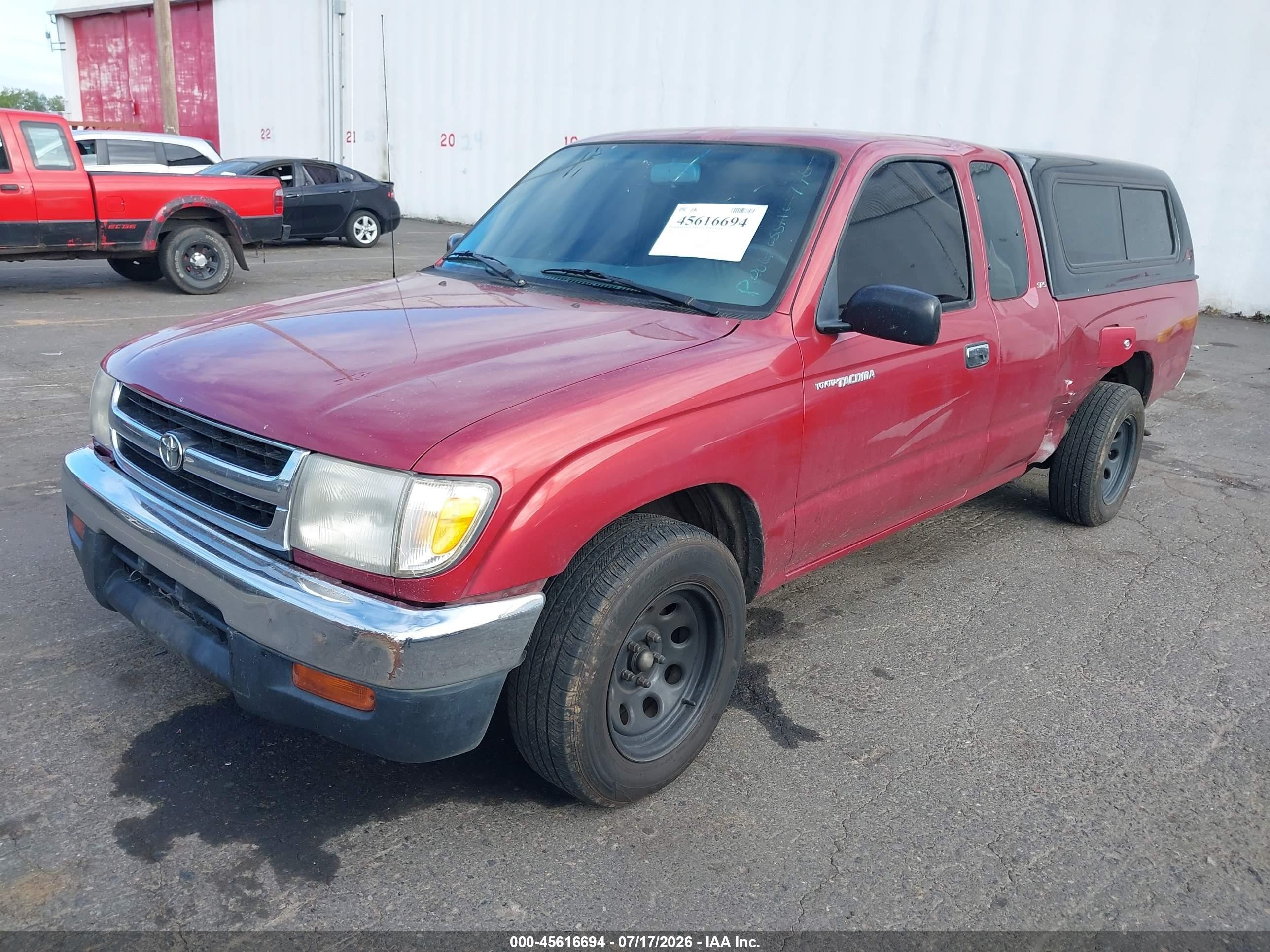 1998 Toyota Tacoma   Red vin: 4TAVL52N1WZ095171
