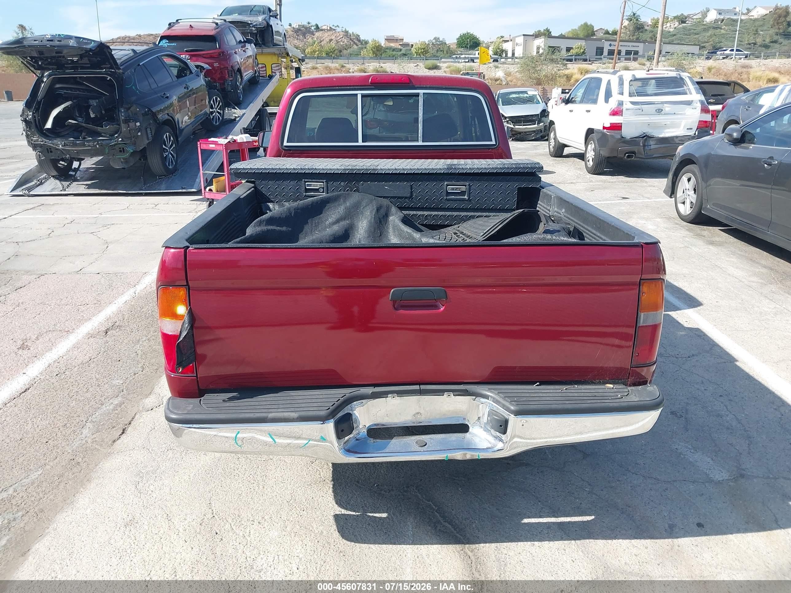 1998 Toyota Tacoma   Red vin: 4TAVL52N7WZ010558